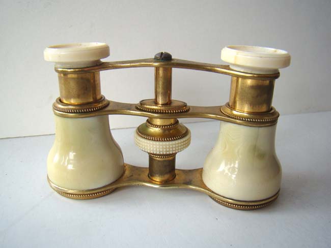 A pair of Italian ivory opera glasses with their original satin lined black leather case made by A. Ramoni, Opticians, of Rome circa 1900. — image 3